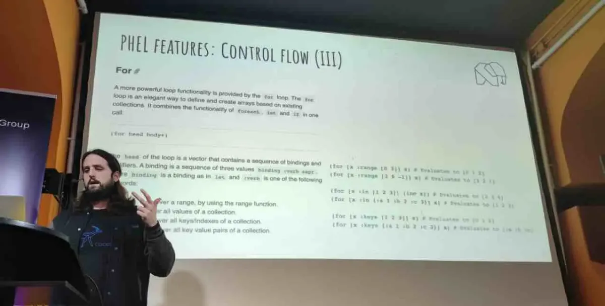 Chema at the lectern beside a slide on Phel’s for loop, Symfony User Group Berlin 2023